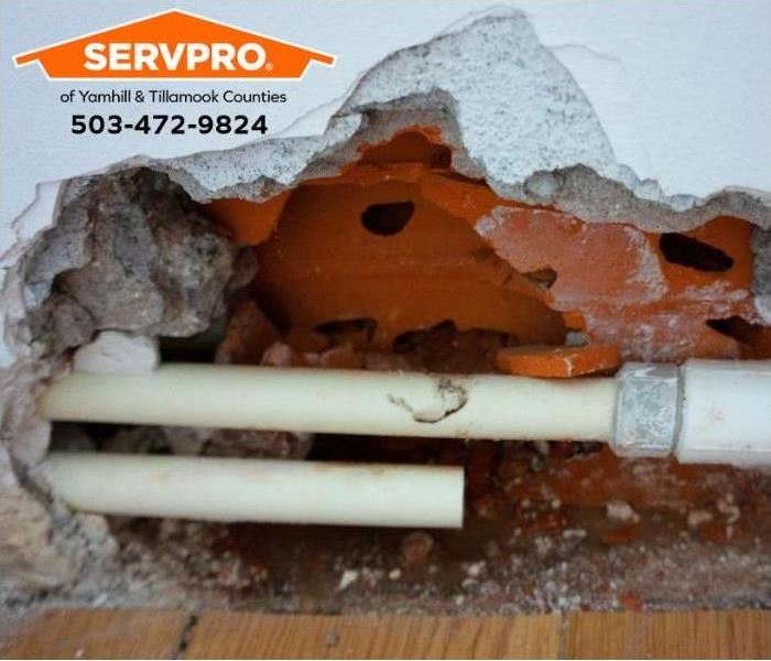 Water damage is exposed once the drywall is removed.